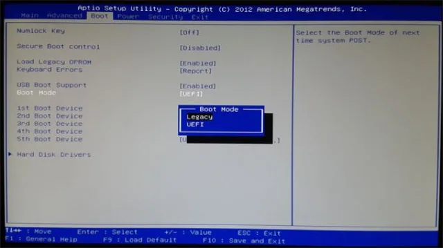 В «Boot Mode» в разделе «System Configuration» выставляем «UEFI Boot»